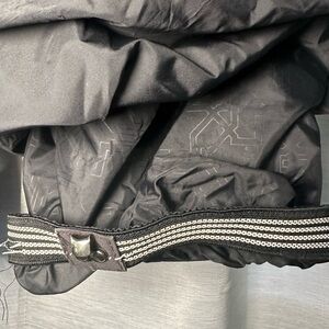 Men’s medium black and white pin-stripped ski pants